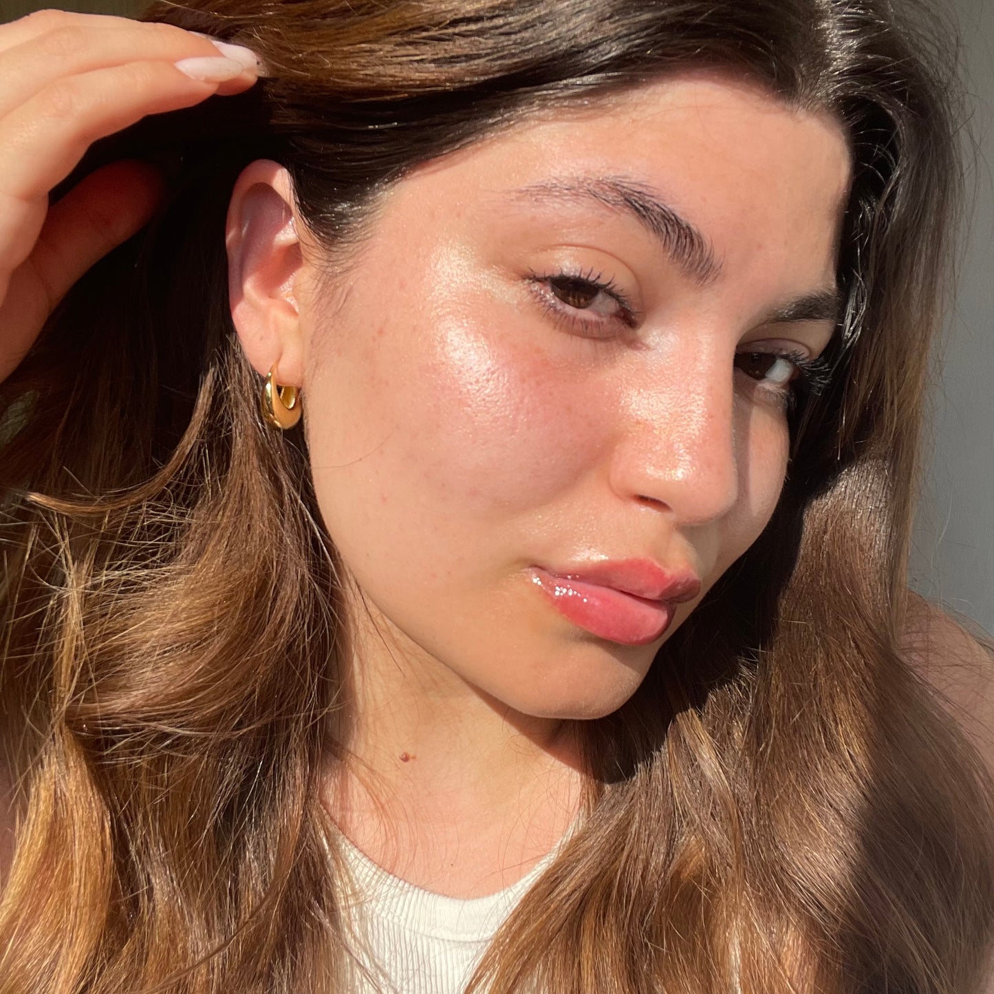 2 IN 1 RADIANCE PRIMER - LIGHT TOUCH